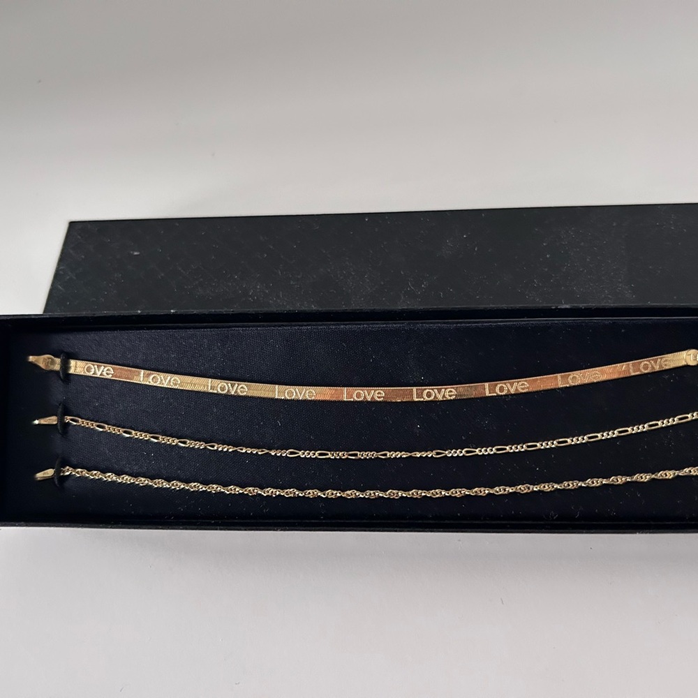 Gold “Love” Bracelets Set of 3.